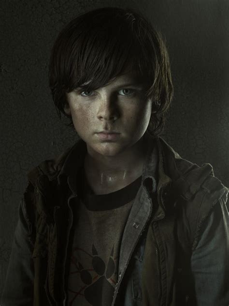 does carl live in the walking dead